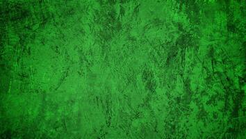 Green textured grunge background with rough and distressed surface, perfect for design, backdrop, or artistic projects. photo