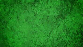 Green textured grunge background with rough and distressed surface, perfect for design, backdrop, or artistic projects. photo