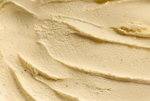 Close-up of creamy vanilla ice cream texture with smooth swirls, showcasing rich and indulgent dessert photo
