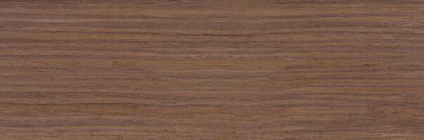 Close-up of natural wood grain texture in a brown color, ideal for backgrounds or design elements. photo