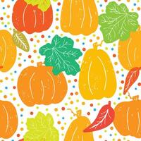 seamless pattern with pumpkins and leaves vector