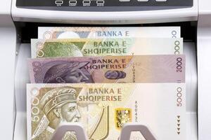 Albanian lek in the counting machine photo