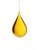 Macro shot of single yellow fluid oil droping floating in the air, droplet liquid oil material isolated on white background photo