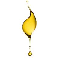 Close up of yellow fluid oil droping floating in the air, droplet dripping liquid oil material isolated on white background photo