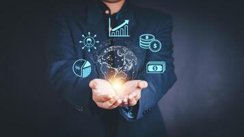 Businessman holding global network connection on social networking and customer data analytics photo