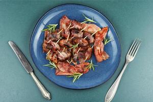 Dates in bacon. photo
