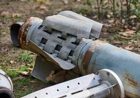 The tail section of a 220 mm rocket for the Uragan rocket fire system on a city flowerbed in Mykolaiv photo