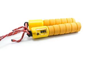 yellow jump rope with jump counter isolated on white background. photo