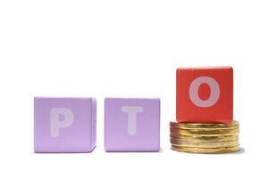 text PTO Paid Time Off on colorful wooden isolated on a white background photo