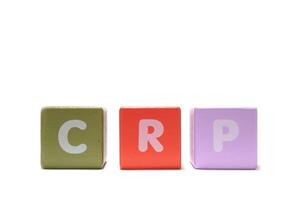 text CRP C Reactive Protein Test on colorful wooden isolated on a white photo