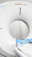 A medical CT or MRI machine is located in a diagnostic clinic, showcasing advanced imaging technology. This essential equipment is vital for accurate diagnoses and ensures high-quality patient care video