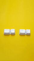 Ctrl C, Ctrl V keyboard buttons, copy and paste key shortcut isolated on a yellow background. photo