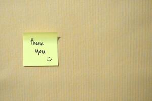 Thank you on sticky notes. Motivational words for personal development, inspirational handwriting. Isolated background photo