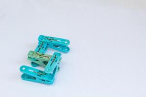 clothespin letter s photographed close up from a side angle with isolated background photo