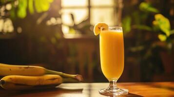 A glass of orange juice with a slice of lemon on top photo