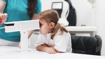 A young girl engages in orthoptic and pleoptic therapy using advanced vision stimulation equipment. Laser eye treatment promotes recovery and enhances vision in a soothing environment video