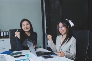 Team of business people are meeting to analyze data for marketing plan,Market research reports and income statistics, Financial and Accounting concept. photo