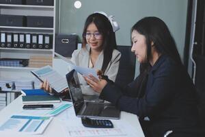Team of business people are meeting to analyze data for marketing plan,Market research reports and income statistics, Financial and Accounting concept. photo