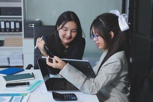 Team of business people are meeting to analyze data for marketing plan,Market research reports and income statistics, Financial and Accounting concept. photo