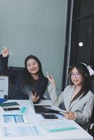 Team of business people are meeting to analyze data for marketing plan,Market research reports and income statistics, Financial and Accounting concept. photo