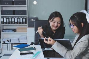 Team of business people are meeting to analyze data for marketing plan,Market research reports and income statistics, Financial and Accounting concept. photo