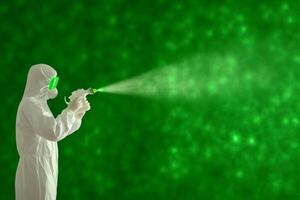 Scientist in protective suit disinfects with glowing bacteria visible in the air during a research study photo