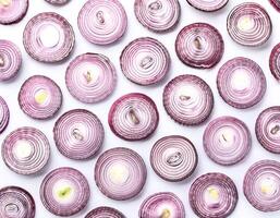 red onion slices. pattern texture background. isolated on white background photo