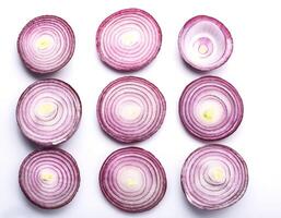red onion slices. pattern texture background. isolated on white background photo
