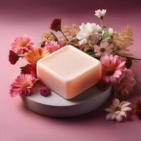 Bar soap is kept on a minimalist background with flowers surrounding it photo