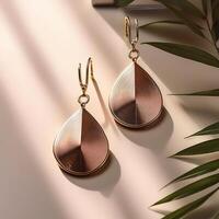 Minimalist Jewelry. Simple earrings placed on a clean table photo