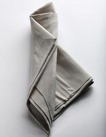Plain folded cloth with white background photo