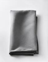 Plain folded cloth with white background photo