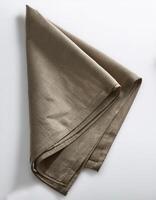 Plain folded cloth with white background photo