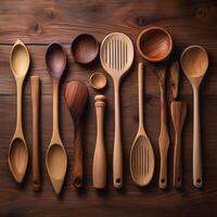 Wooden cooking utensils arranged neatly on a wooden surface photo