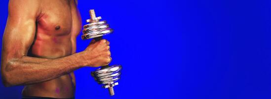Unrecognizable Black Guy Exercising With Dumbbells Building Muscles During Strength Workout On Blue Studio Background. Panorama, Cropped photo