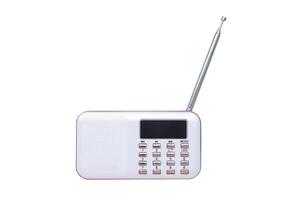 Mini portable radio, isolated on white background. Concept, audio electronics for listening to music, songs or news from radio wave channel station. Analog amplifier for relaxation and lifestyle. photo
