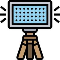 A light on a tripod with a camera on it vector