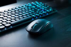 Sleek mouse next to a keyboard with glowing blue keys on a wooden surface photo