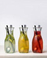Three types of cold and vitamin-rich lemonade. Cold and refreshing drinks. photo