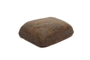 Hashish bock isolated on white background photo