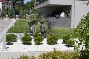 Bicycle parking in a modern European courtyard of an apartment building photo