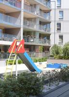 Children's playground in a European apartment building photo