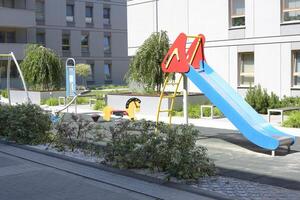 Children's playground in a European apartment building photo