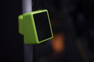 Means of payment for travel. Electronic device in bus. Ticket information reader. photo