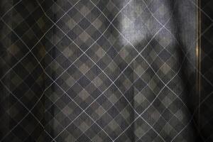 Curtains on the window. Curtains in the room. Fabric in the light. photo