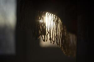 Light from the window. Fabric in rays of light. Morning rays. photo