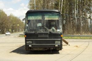 Bus in the countryside. Intercity bus on a country road. photo