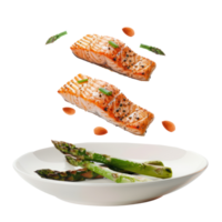 floated grilled salmon and asparagus falling into a plate isolate on transparency background png