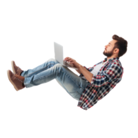 full body young man laying in the air floating while using laptop isolate on transparency background png