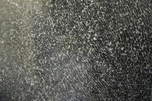 Shards of glass. Crack on the window. Fine mesh of cracks. photo